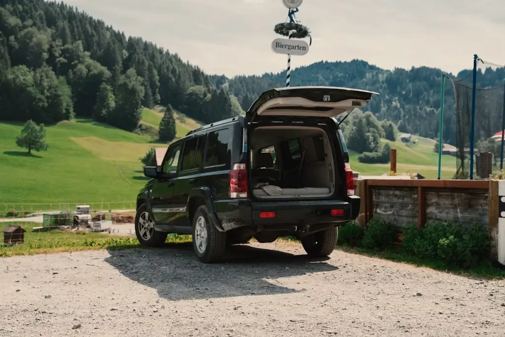 A camper van standing in a field in rural switzerland
