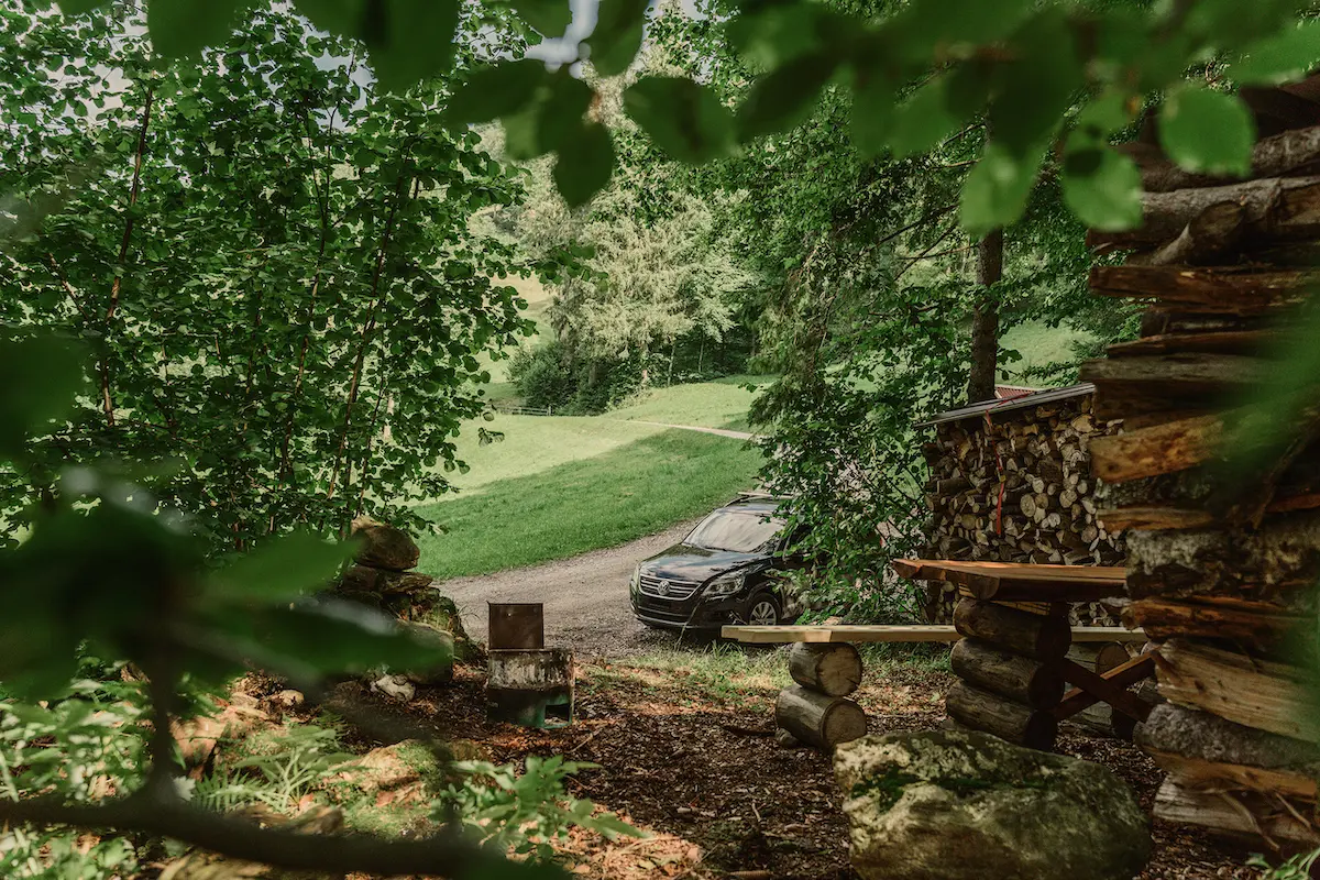 A camper van standing in a field in rural switzerland